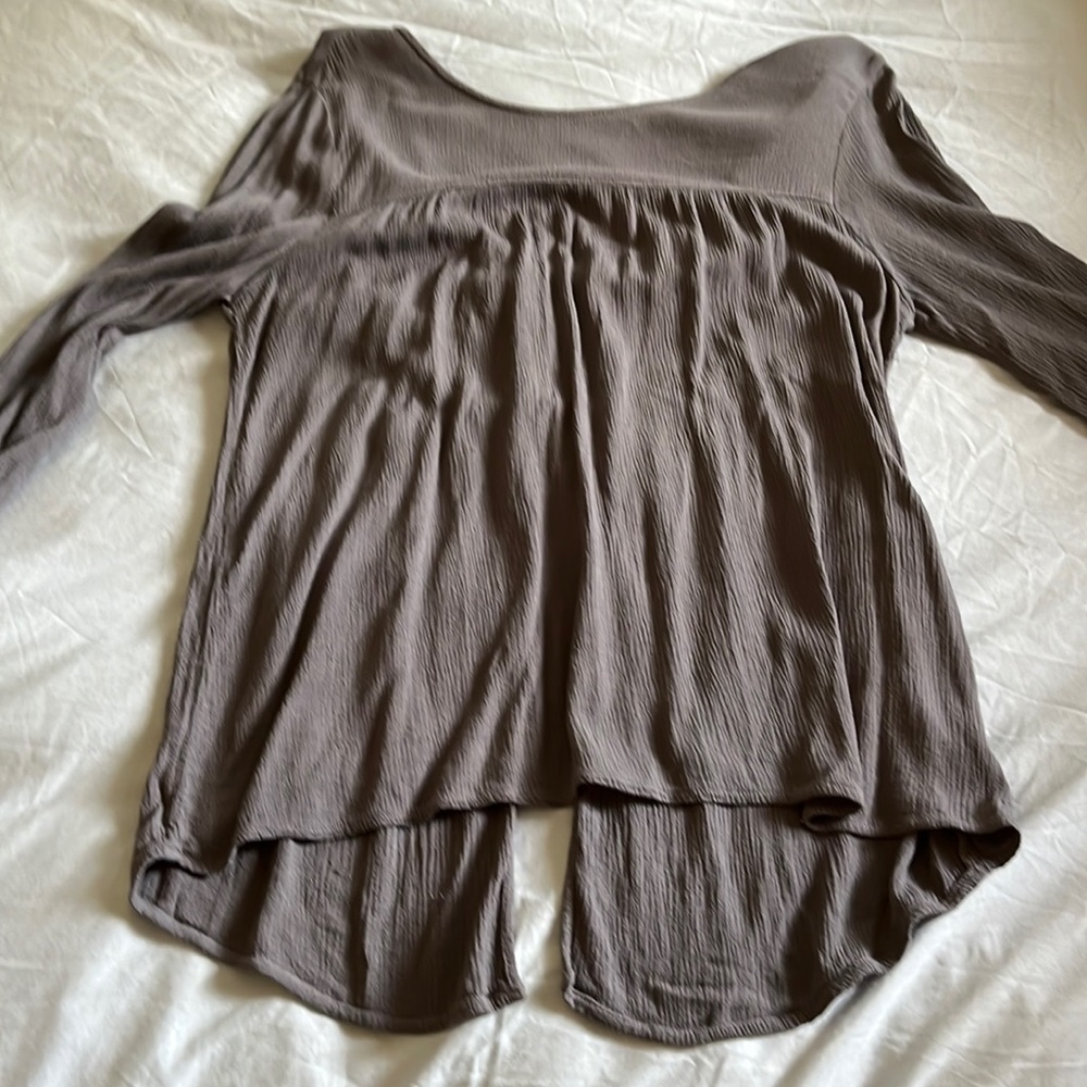 Velvet crepe top with low back v- neck & open drape babk